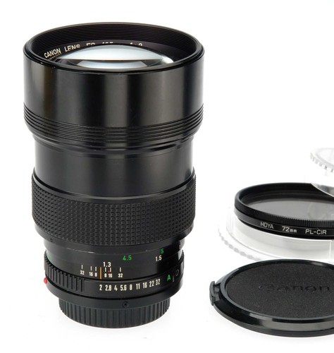 Raro canon 135 f - mm.,